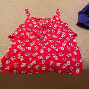Red blouse tank with blue and white flowers
